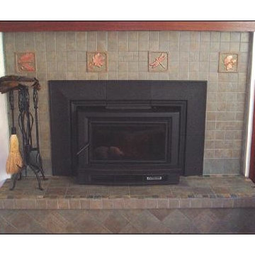 fireplace  tiled using modified Batchelder  design