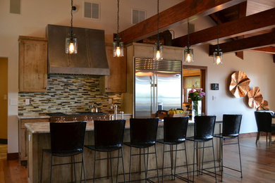 Open concept kitchen - large rustic single-wall medium tone wood floor open concept kitchen idea in Philadelphia with an undermount sink, shaker cabinets, medium tone wood cabinets, granite countertops, multicolored backsplash, matchstick tile backsplash, stainless steel appliances and an island