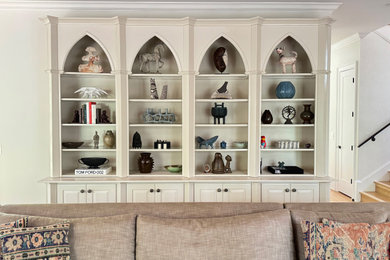 Transitional family room photo in Nashville with white walls
