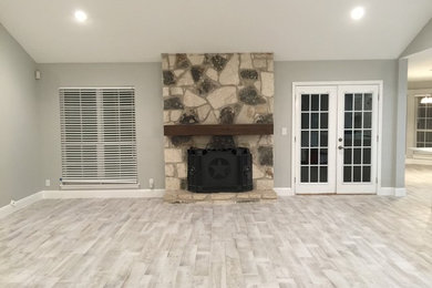 Example of a transitional living room design in Austin