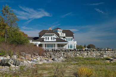 Coastal gray three-story wood exterior home idea in New York
