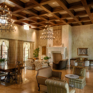 Diseño de salón para visitas abierto, mediterráneo, extra grande, sin televisor, con paredes beige, suelo de travertino, chimenea tradicional, marco de chimenea de madera y suelo beige