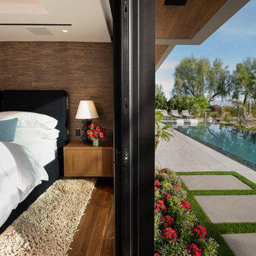 Bighorn Palm Desert luxury modern home resort style primary bedroom and pool ter