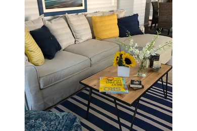 Island style living room photo in Tampa
