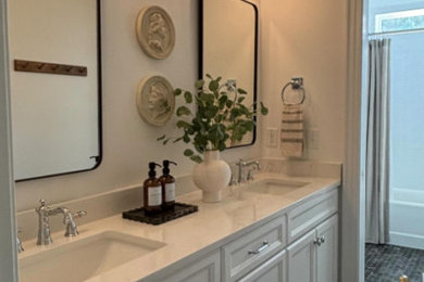 Bathroom - transitional marble floor bathroom idea in Raleigh with white countertops and a built-in vanity