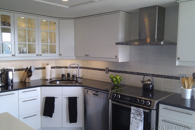 Example of a minimalist kitchen design in Vancouver