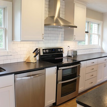 Geneseo, IL- White Painted Kitchen with Matte Black Granite and Subway Tile