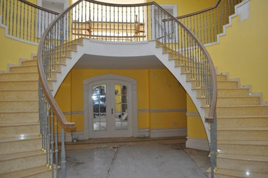 Curved Staircase with Brass