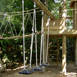 Brilliantly fun swing set and fire mans pole in a perfect woodland play area. - Garden Playhouses