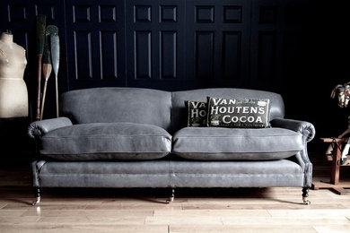 Bespoke re-upholstered leather George Smith signature sofa