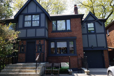 Inspiration for a rustic exterior home remodel in Toronto
