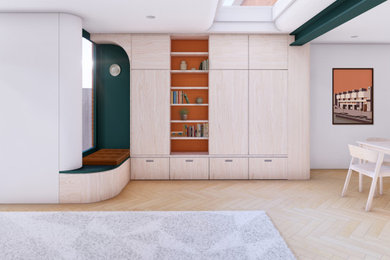 Inspiration for a modern living room in London with a reading nook, light hardwood flooring and exposed beams.