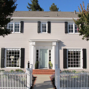 Traditional Home with Raised Panel Shutters