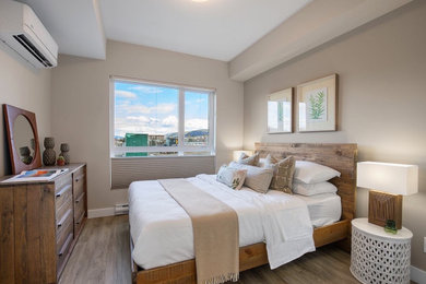 Bedroom - mid-sized transitional master vinyl floor and brown floor bedroom idea in Other with beige walls