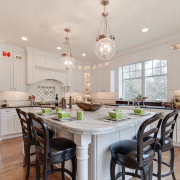 Mont Blanc Quartzite & Silver Pearl Granite in a White Kitchen