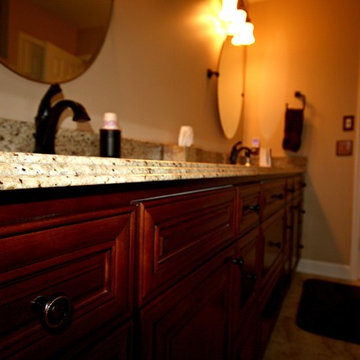 Master Bathroom with Frameless Shower and Jetted Tub