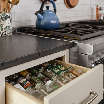Warm Traditional Kitchen Remodel with Cream Cabinets & Herringbone Floors