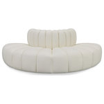Meridian Furniture - Arc Upholstered Outward Curved Modular Sectional, Cream, 4-Piece: 4 Reverse Corner, Vegan Leather - Unleash modern opulence with the Arc Vegan Leather 4pc. Sectional. Crafted for the modern connoisseur, this Sectional injects an air of refined luxury into any space. Its sleek silhouette, upholstered in supple cream vegan leather, exudes timeless sophistication while the deep channel tufting adds textural intrigue, further elevating the chair's visual appeal. The modular design makes it a versatile chameleon, effortlessly adapting to your evolving needs and preferences. Whether you envision it gracing a chic living room corner, basking in the glow of a bedroom window, or adding a touch of drama to a home office, the Arc seamlessly complements your unique interior aesthetic.