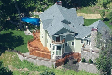 Island style home design photo in New York