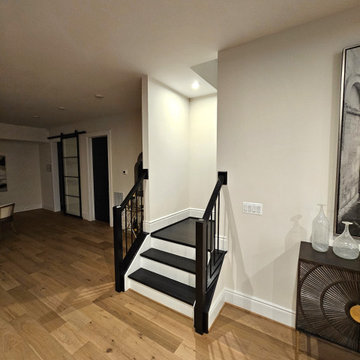 Project #130 | Curved Staircase with Wraparound Balcony