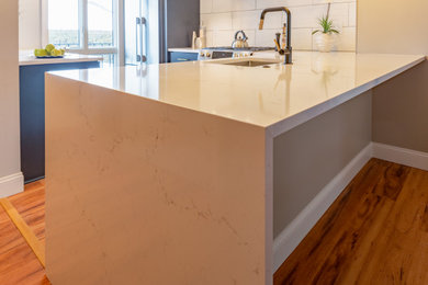 Example of a trendy kitchen design in Detroit