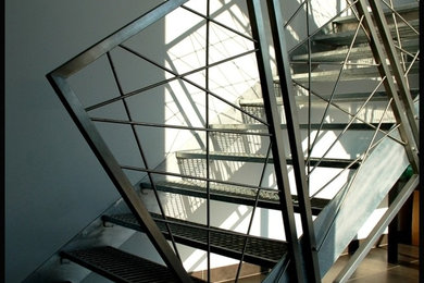 Inspiration for an industrial staircase remodel in Other