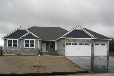 Example of an arts and crafts exterior home design in Minneapolis