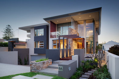This is an example of a large contemporary two-storey grey exterior in Perth.