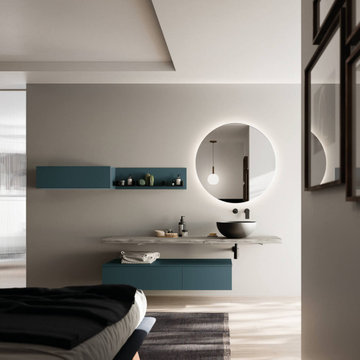 Modern green bathroom vanity with wood countertop