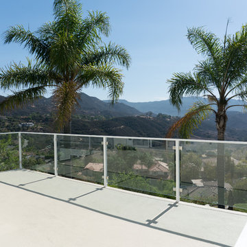 Custom Glass Panel Railing, Balcony Waterproofing, Walkway