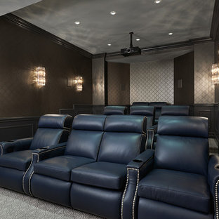 Photo of an expansive classic enclosed home cinema in Detroit with grey walls, carpet and a projector screen.