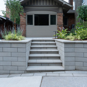 Front Entrance Transformation with Retaining Walls & Lighting