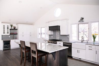 Example of a transitional kitchen design in Denver