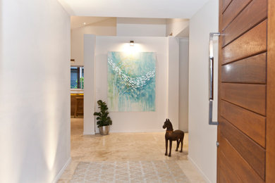 Photo of a mid-sized contemporary entryway in Gold Coast - Tweed.