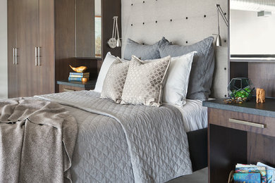 Mid-sized minimalist loft-style concrete floor and gray floor bedroom photo in Toronto with gray walls