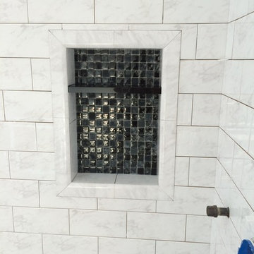 Picture frame shower niche.
