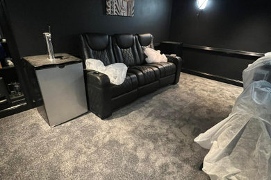 Mid-sized carpeted and gray floor home theater photo in Atlanta