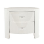 Bernhardt - Bernhardt Axiom Oval Nightstand - Sometimes minimal design treatments can evoke intriguing beauty and sophistication. This is true of the Axiom Oval Nightstand. This softly curved nightstand uses our "fancy face" pyramid design on its veneered drawer fronts for added warmth and visual interest. The contrasting grain patterns create the triangular shape and highlight the beauty of our engineered faux anigre veneer. Clear acrylic handles with brushed metal fasteners ensure you can experience the full beauty of this grain design.