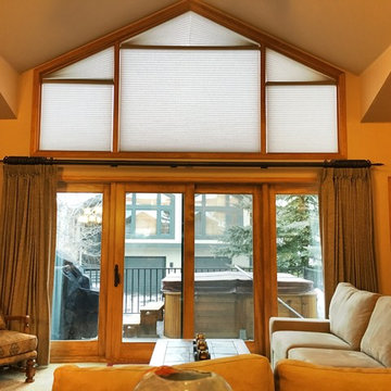 Motorized Hunter Douglas Duette Honeycomb Shades on Triangle Windows