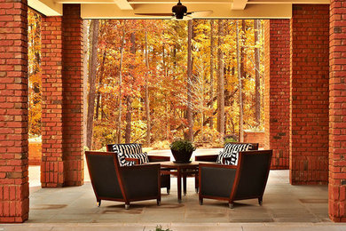 Example of a trendy backyard patio design in Raleigh