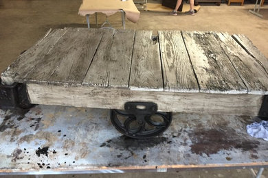 Side or coffee table made from railroad push cart
