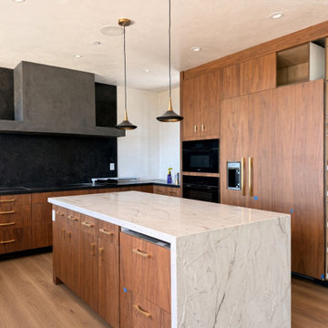 Cream Quartzite Waterfall Island with Black Stone Perimeter