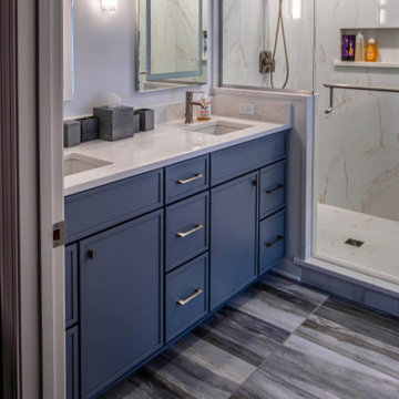 Primary Suite Remodel with Blue Cabinetry and Calacatta Miraggio Duo Quartz