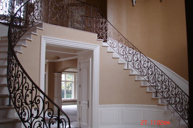 Marble stairs  ornamental steel railing