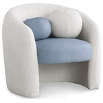 Meridian Furniture - Acadia Black Boucle Fabric Accent Chair, Blue - Sink into the sumptuous comfort of this Acadia boucle fabric accent chair. This lovely chair features a timeless barrel-style design with a modish twist that makes it perfect for both contemporary and traditional rooms. The curvy, rounded back adds an instant look of sophistication to your space while the rich cream boucle fabric and soft blue vegan leather seat feels great against the skin and lends a textured appeal to your living area. Pair it with a matching sofa or chaise, or buy two to create the perfect reading nook in an unused corner.