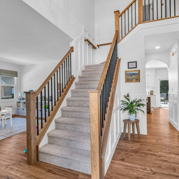 Fishers First Level Remodel Featuring: Kitchen, Butler Pantry, Stairs, Fireplace