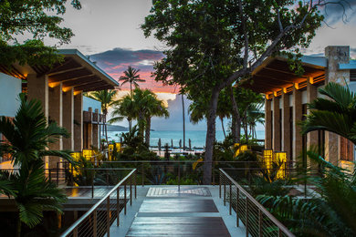 Example of an island style exterior home design in Houston