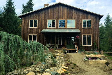 Farmhouse exterior home idea in Seattle
