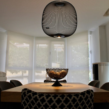 Mesa con lámpara colgante en el salón-comedor | CASA ROBLE