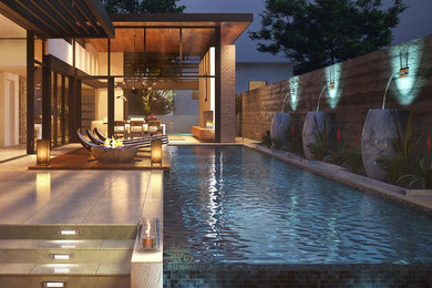 Pool - large modern backyard tile and rectangular infinity pool idea in Los Angeles